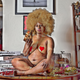 Burlesque performer The Incredible Edible Akynos on Sondhe’s kitchen table.